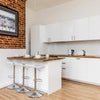 Photo 4: Kitchen and breakfast bar with all mod cons.  Flat is a minute from Southsea Common