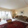 Photo 6: Large lounge with two giant sofas