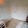 Photo 2: fitted wardroab on left