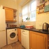 Photo 5: Kitchen accommodating washing machine, dishwasher & fridge freezer