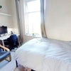 Photo 4: The big blue chair is not in the room anymore