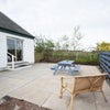 Photo 1: Patio area of the garden studio