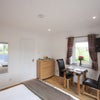 Photo 6: seating area, door to toilet