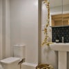 Photo 7: Ensuite stylised bathroom in ecah room