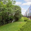Photo 6: The backyard of the house is by the canal with a beautiful view/walk