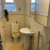 Photo 8: Private bathroom with towel radiator, shaver point, splashwall (easy clean) shower panels