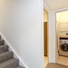 Photo 6: Separate laundry room 