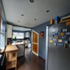 Photo 5: Our social kitchen with breakfast bar, stools, large American style fridge and plentiful storage. Lo