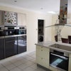 Photo 6: Miele appliances, combi-oven, microwave, steam oven, tepan, fridge-freezer.