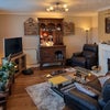 Photo 3: The cosy lounge, ideal during the winter months