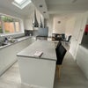 Photo 4: Shared kitchen and sitting room 