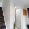 Photo 3: Entrance Foyer - Access to kitchen and upstairs rooms