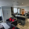 Photo 4: Communal Living and Kitchen Area 