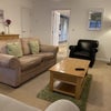 Photo 2: Spacious modern communal lounge with large smart TV and underfloor heating 