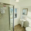 Photo 6: SHARED SHOWER ROOM