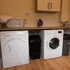 Photo 7: Separate laundry area
