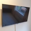 Photo 5: Wall mounted TV in bedroom