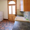 Photo 5: Utility room with second fridge