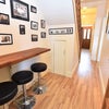 Photo 7: Breakfast bar and hallway