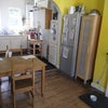 Photo 6: Kitchen/living room (kitchen since painted orangey/red!)