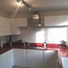 Photo 5: Bright, modern kitchen with dishwasher.