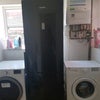 Photo 4: Utility room with fridge freezer, washing machine and tumble dryer