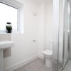 Photo 6: COMMUNAL SHOWER ROOM