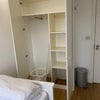 Photo 4: Built in Hanging and shelving with basket
