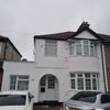Photo 1: Front of house with off-street parking for 2 cars