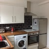 Photo 3: One of the kitchens