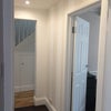 Photo 1: Downstairs hallway