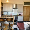 Photo 2: Kitchen/ Living Area
