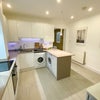 Photo 9: Fully equipped kitchen