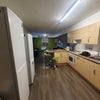 Photo 5: Communal kitchen - the kitchen for the flat will look similar to this with 2 fridges like this one