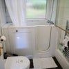 Photo 7: MODERN BATH AND TOILET