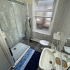 Photo 7: Shared bathroom / shower