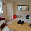 Photo 1: Open Plan Living leading to Laundry Rm