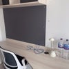 Photo 4: Close up of desk (3 drawers and 2 shelves above with pin board)