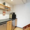 Photo 4: Kitchen  fridge ,freezer ,microwave.  electric hobs and a mini oven