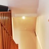 Photo 9: stairs up to the bedroom