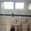 Photo 5: Shared: 1st floor Bathroom/Toilet