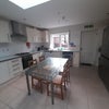 Photo 3: The ground floor kitchen eith dining