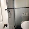 Photo 2: En suite power shower basin and toilet 
