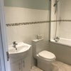 Photo 4: Bathroom is shared with one other