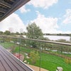 Photo 1: Balcony and View over the Nature Reserve