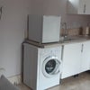 Photo 1: Kitchen/living area