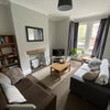 Photo 5: Spacious modern shared TV lounge with west facing bay window