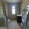 Photo 5: Toilet/Shower 