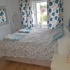 Photo 2: Sleeping area with double bed
