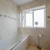Photo 4: Bathroom (shower above bath)